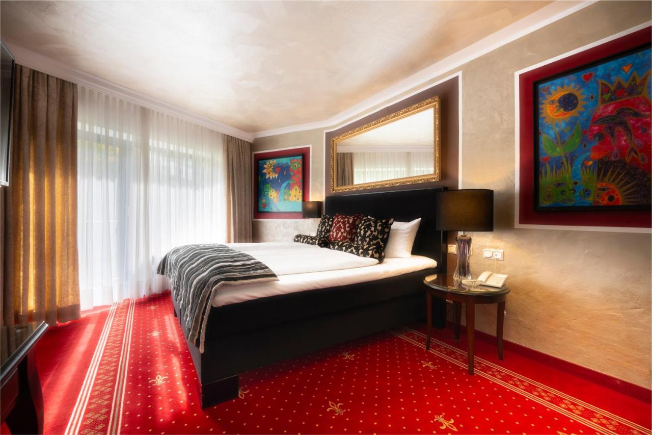 Alpin & Wellness Resort Hotel Ludwig Royal Оберщауфен Екстериор снимка